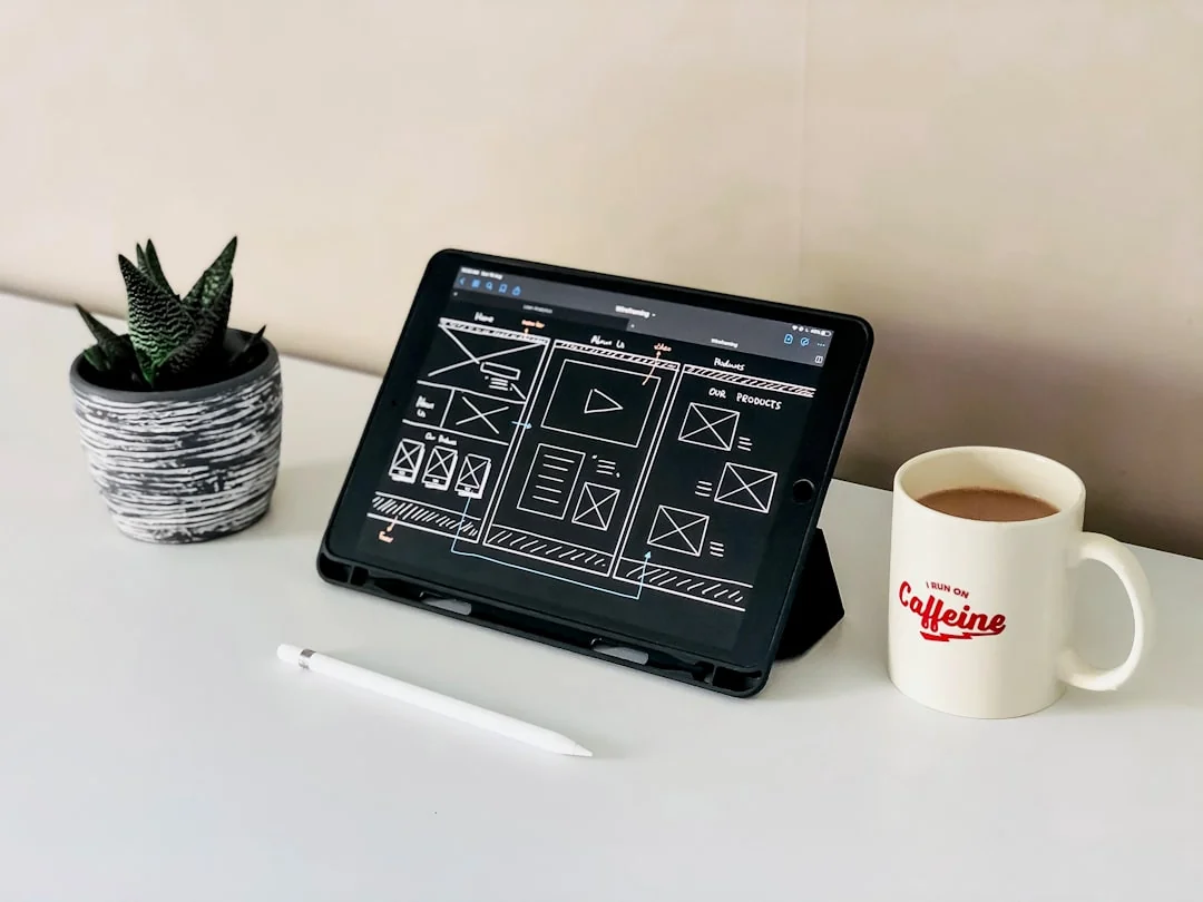 A person using a laptop to browse stock photo websites. Freelancing work in a cozy setting.